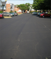 Repaired asphalt driveway