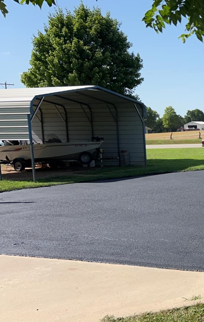 Repaired asphalt driveway