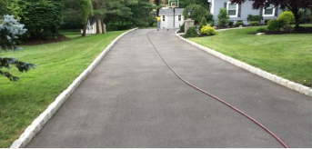 Damaged asphalt driveway